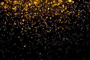 textura de iluminação de bokeh de brilho dourado turva fundo abstrato para aniversário, aniversário, casamento, véspera de ano novo ou natal foto