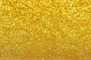 textura de iluminação de bokeh de brilho dourado turva fundo abstrato para aniversário, aniversário, casamento, véspera de ano novo ou natal foto