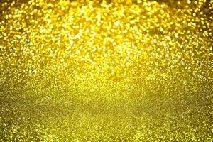 textura de iluminação de bokeh de brilho dourado turva fundo abstrato para aniversário, aniversário, casamento, véspera de ano novo ou natal foto