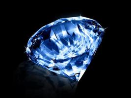 deslumbrantes pedras preciosas de diamante azul em fundo preto foto