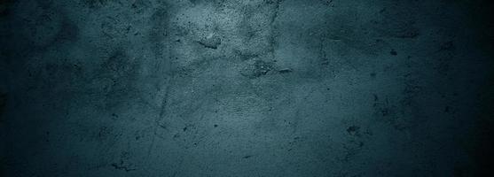 arranhões de escova na parede. paredes escuras assustadoras, textura de cimento de concreto preto ligeiramente leve para o fundo. foto