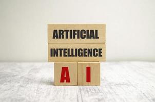 palavra ai ou conceito de inteligência artificial, escrito com o conceito de madeira cubes.tech. foto