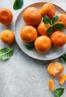 frutas cítricas frescas tangerinas, laranjas foto