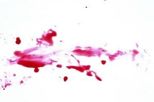 manchas de sangue isoladas no fundo branco foto