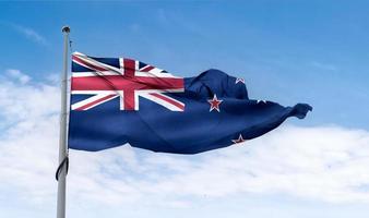 bandeira da nova zelândia - bandeira de tecido acenando realista foto