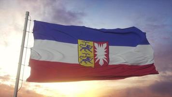 bandeira de schleswig holstein, alemanha, balançando ao vento, céu e sol de fundo. renderização em 3D foto