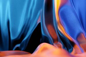 Ilustração 3D da textura de um tecido natural azul com dobras. abstrato de close-up de tecido bonito natural. cortinas vermelhas, cortina de palco foto
