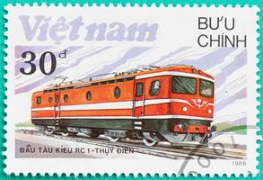 selos postais impressos no vietnã mostram trem locomotiva a diesel foto