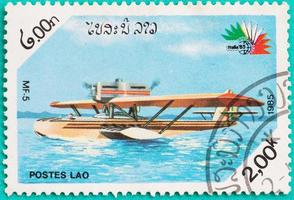 selos postais usados com impressão no laos mostra avião foto