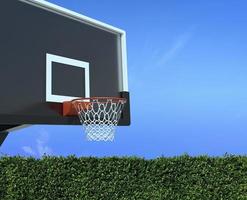 cesta de basquete no quintal e céu azul brilhante foto