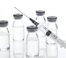 seringas e frascos para medicamentos de vidro