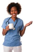 enfermeira americana Africano bebendo café foto