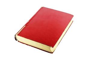 livro vermelho velho isolado no branco foto