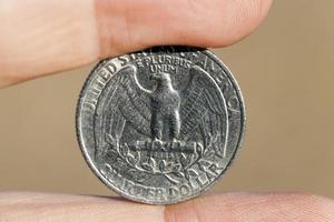 moeda na mão foto