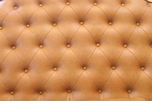 estofamento de couro de um sofá magnífico foto