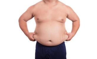 homem gordo com uma barriga grande. dieta foto