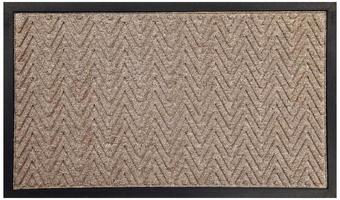 borracha preta bege padrão em ziguezague e capacho de lã foto