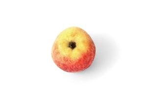maçã amarela vermelha sobre fundo branco foto