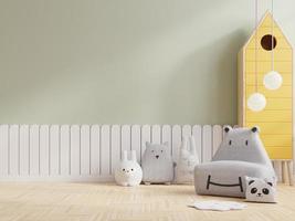 parede de maquete no quarto das crianças com sofá cinza na parede de cor verde clara. foto