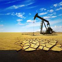 bomba de óleo máquina industrial de energia de plataforma de petróleo para petróleo no fundo da terra seca com rachaduras. ecologia de conceito foto