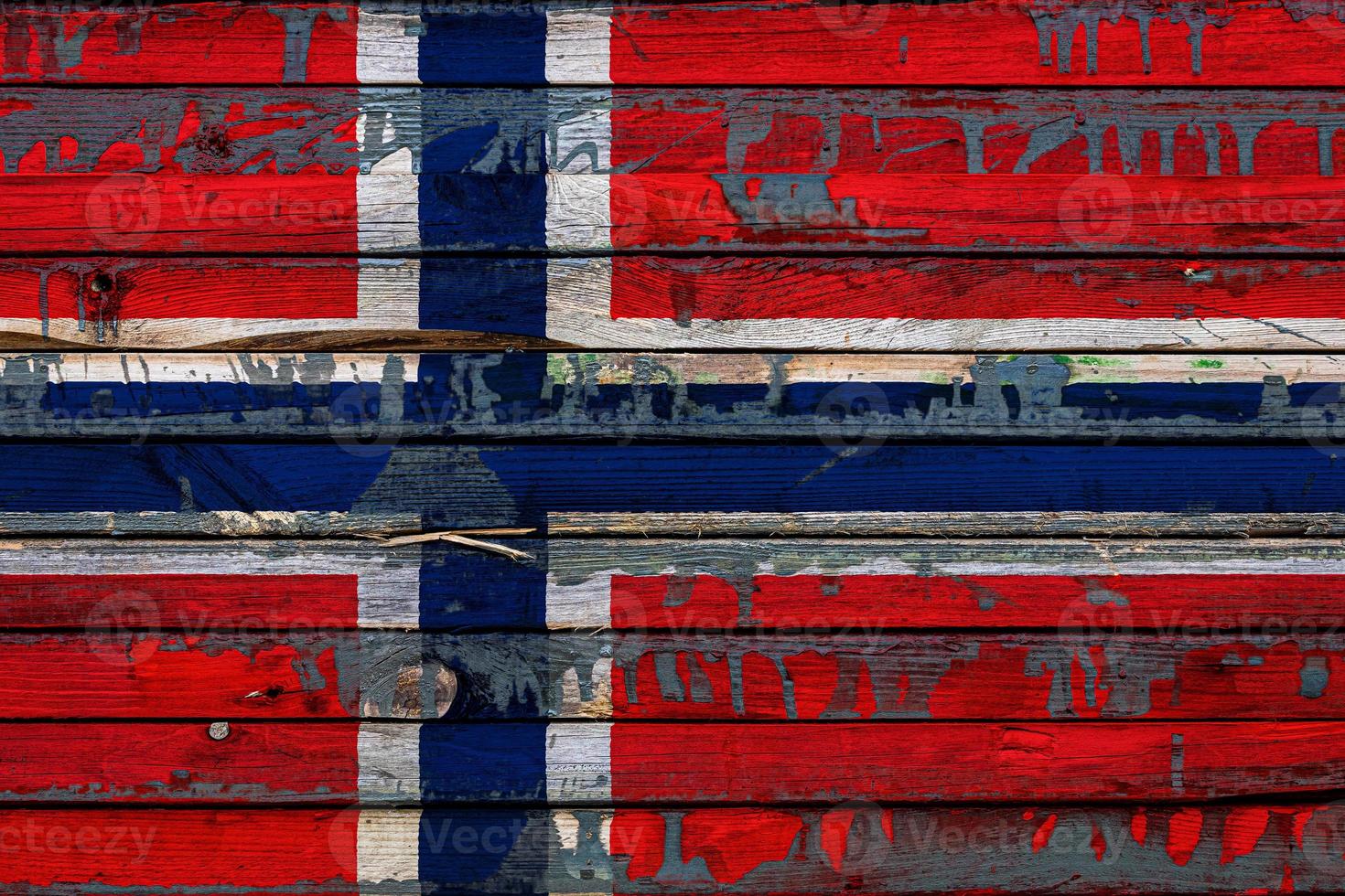 die nationalflagge von norwegen ist auf unebenen tafeln gemalt. Ländersymbol. foto