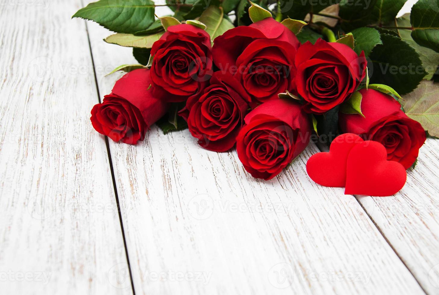 rote Rosen und Herzen foto