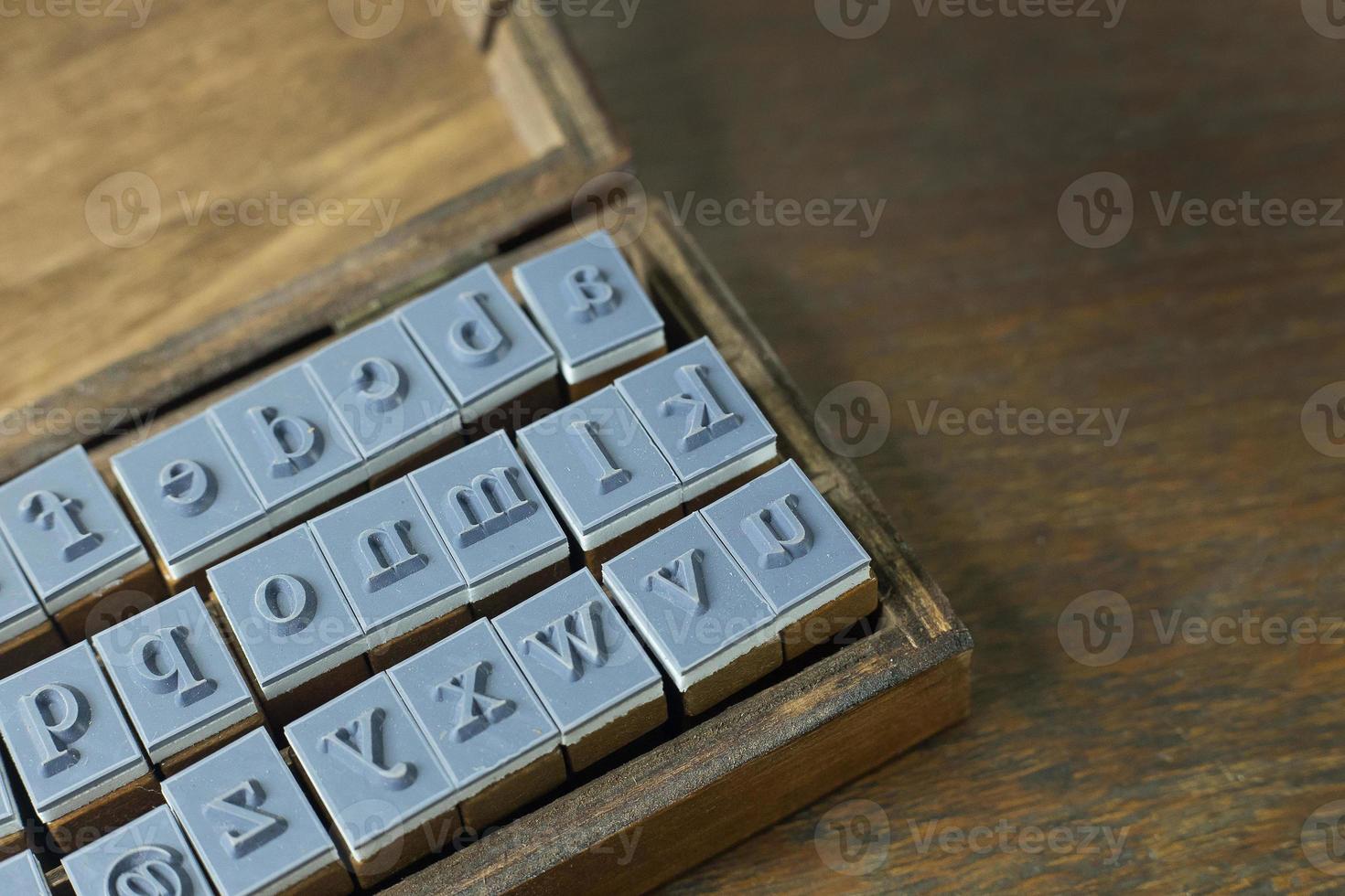 Holz Stempel Alphabet Nahaufnahme Bild für den Hintergrund. foto