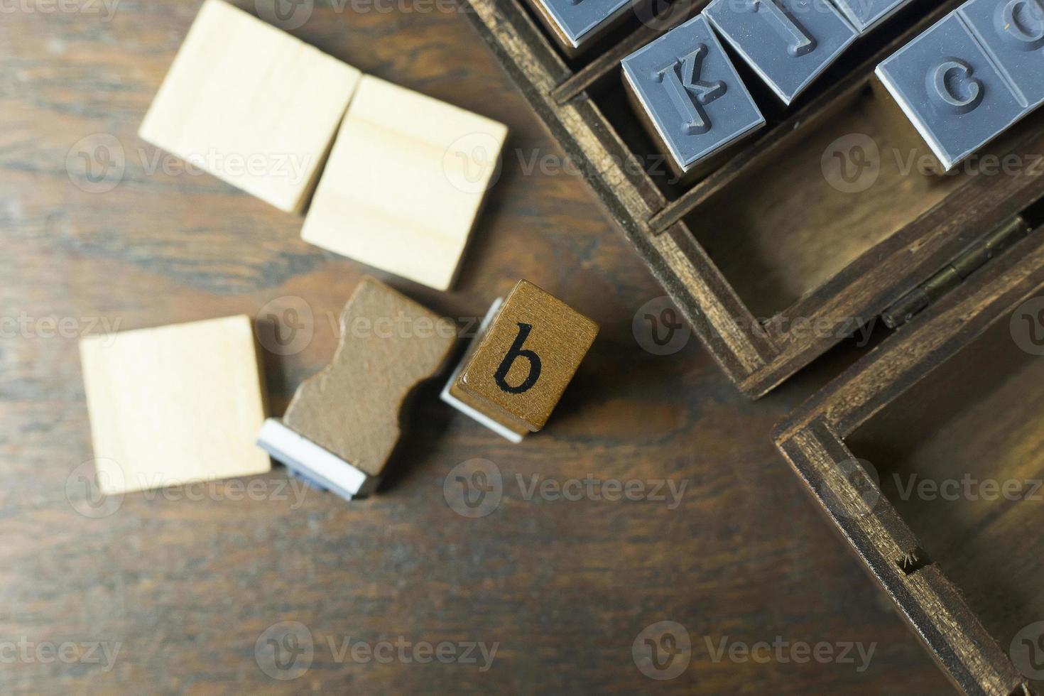 Holz Stempel Alphabet Nahaufnahme Bild für den Hintergrund. foto