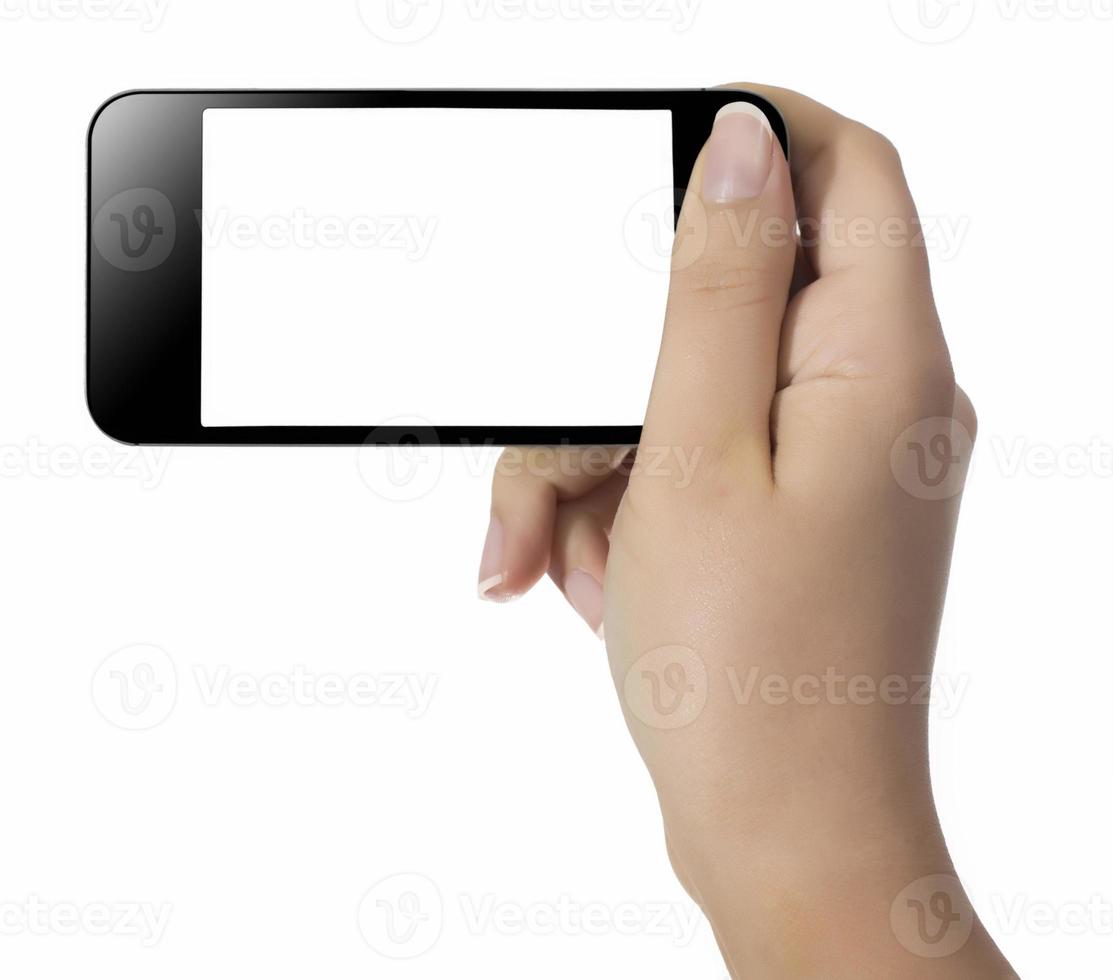 Hand hält Handy foto