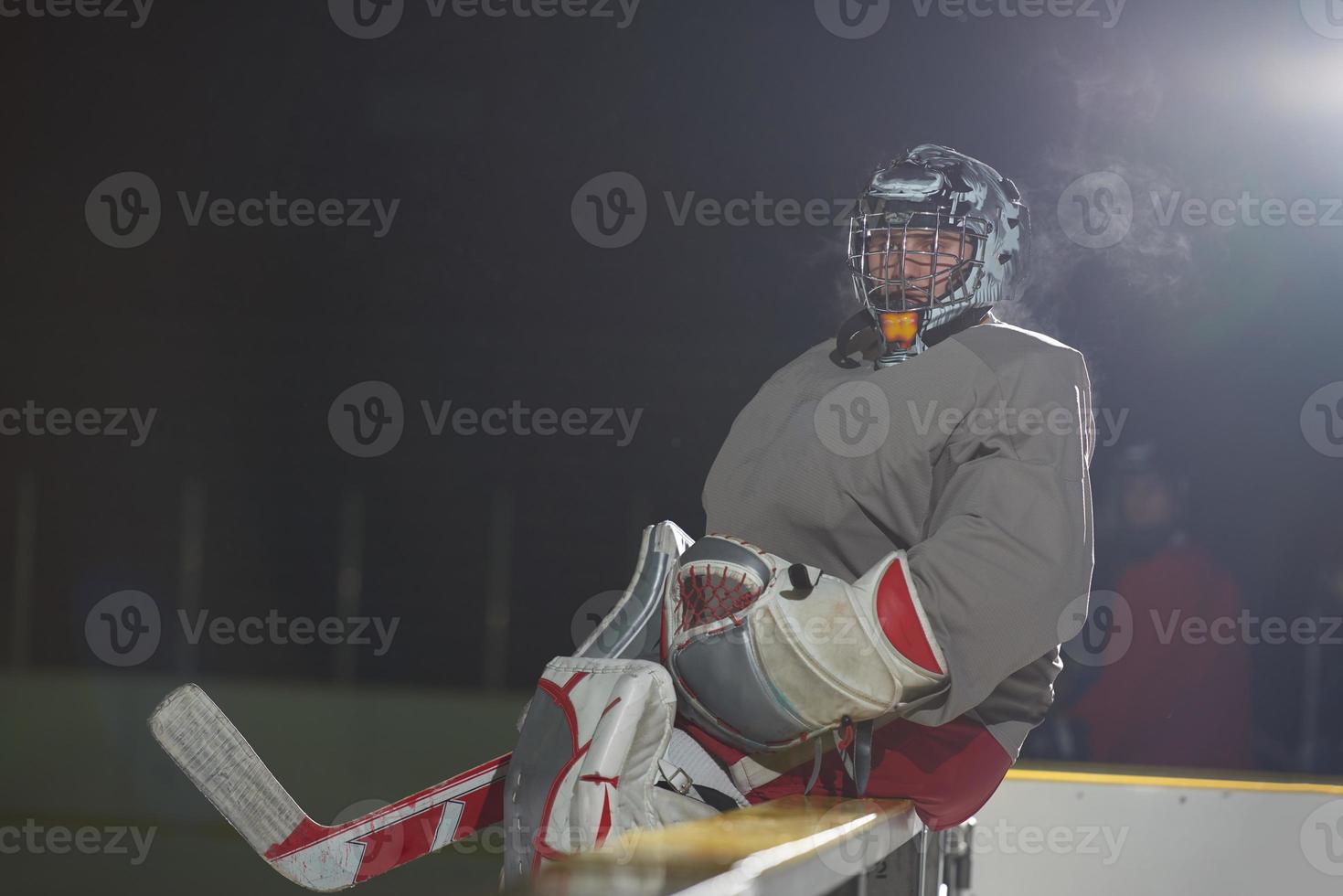 Eishockeyspieler auf der Bank foto