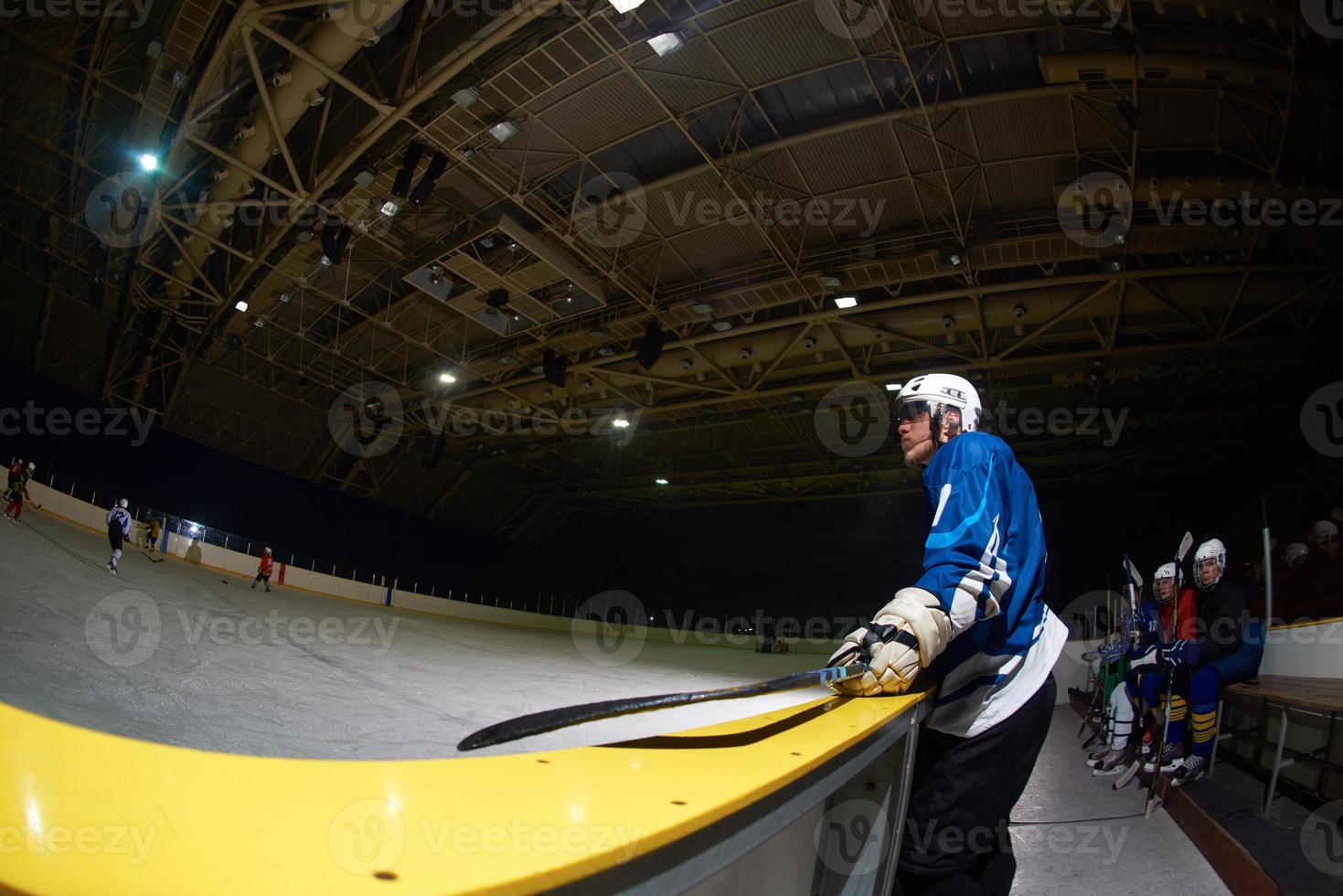 Eishockeyspieler auf der Bank foto