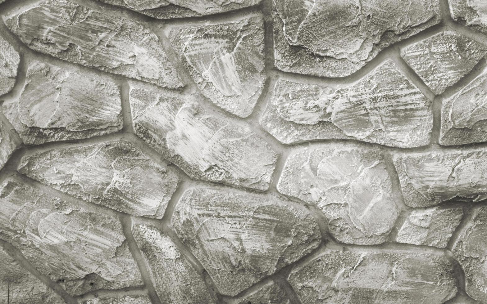 abstrakter hintergrund der kalksteinmauer mit schmutz- und rostflecken, schmutzigen kratzern. foto