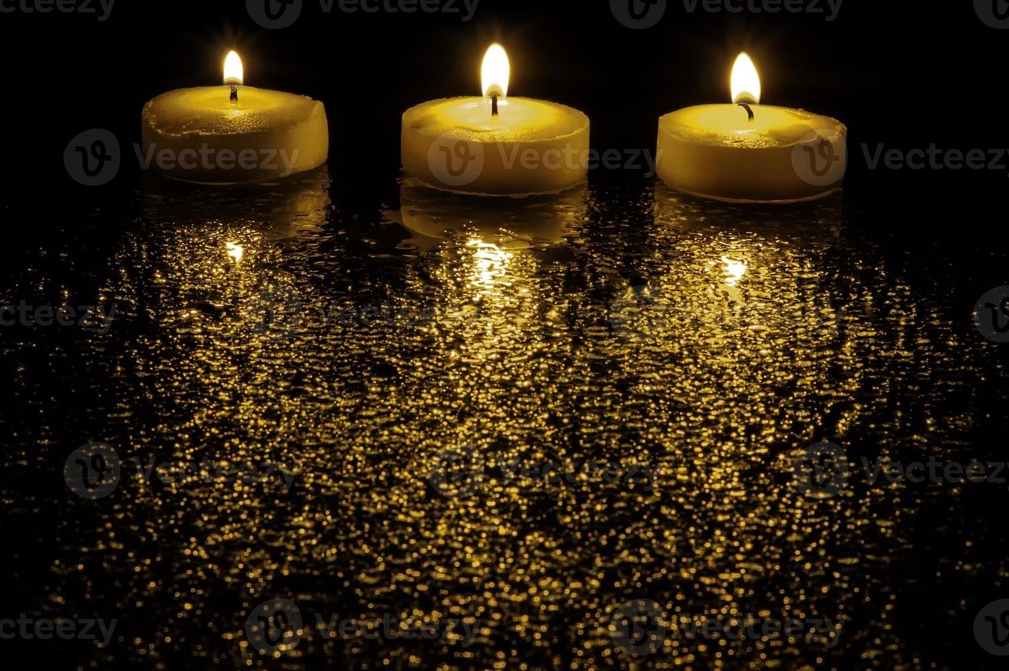 Licht von drei Kerzen foto