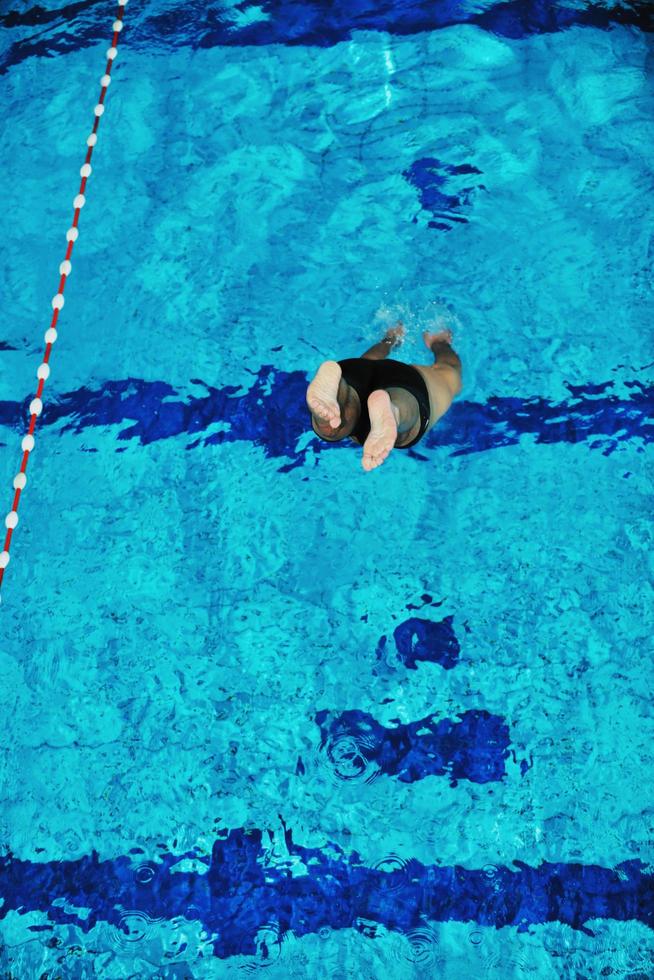 Schwimmer im Pool foto