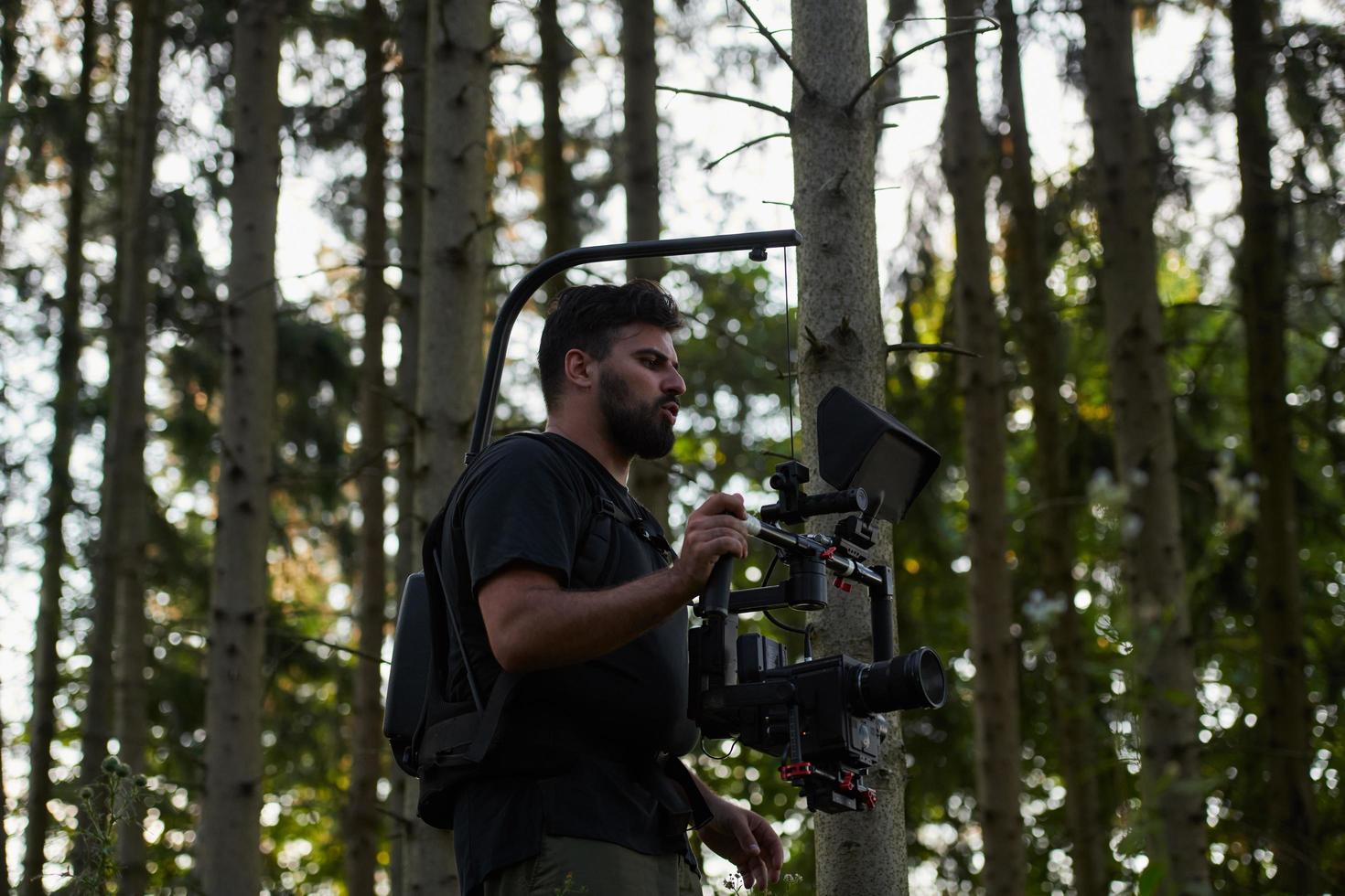 Videofilmer beim Action-Shooting von Soldaten in Aktion foto