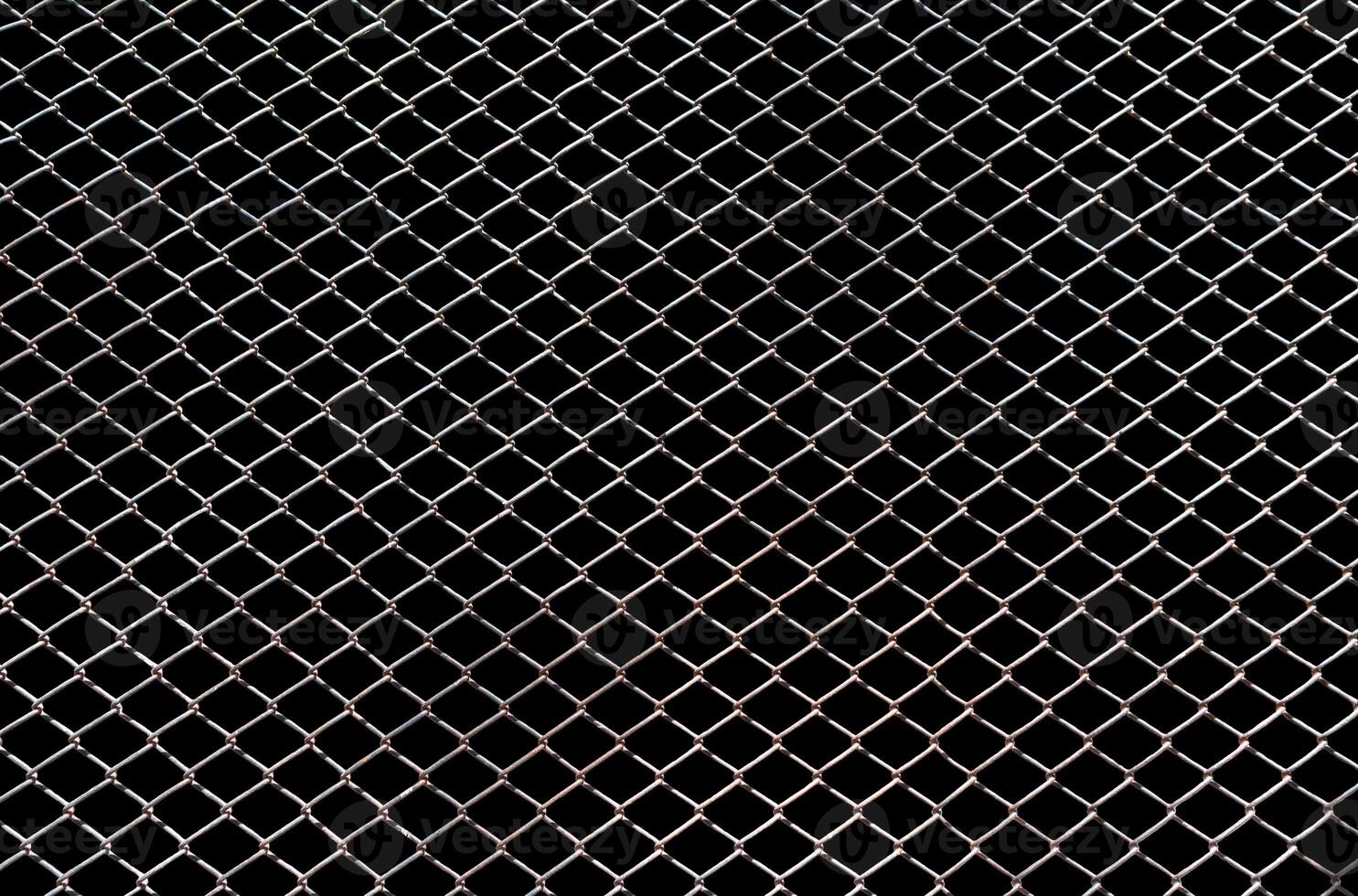 Stahldrahtzaun isoliert auf schwarzem Hintergrund mit Beschneidungspfad foto