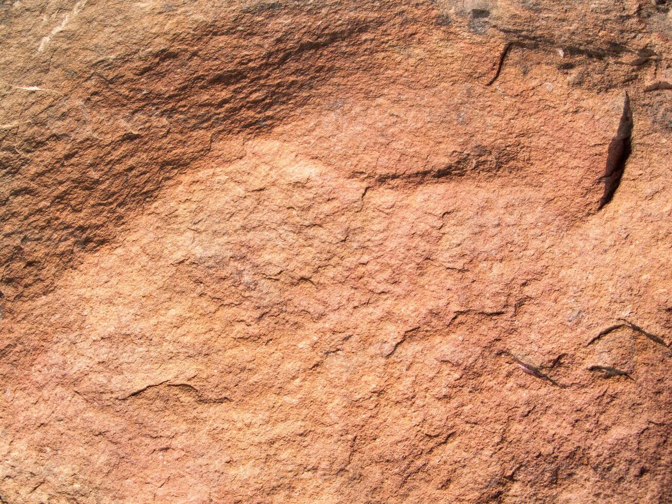 die textur des steins, der für hintergrundbilder verwendet wird, oberfläche der steinbraunen farbe foto