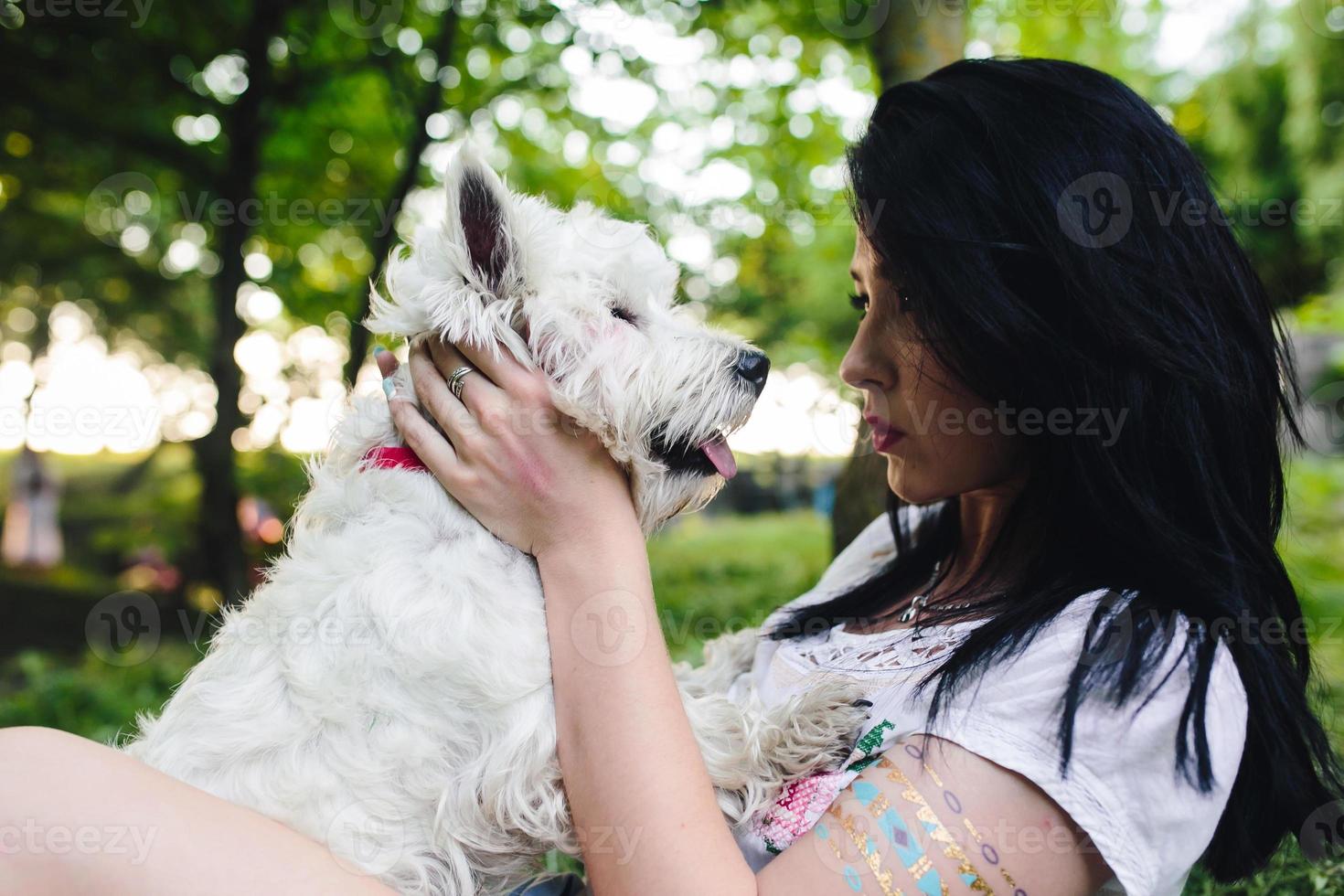 Mädchen mit ihrem Hund foto