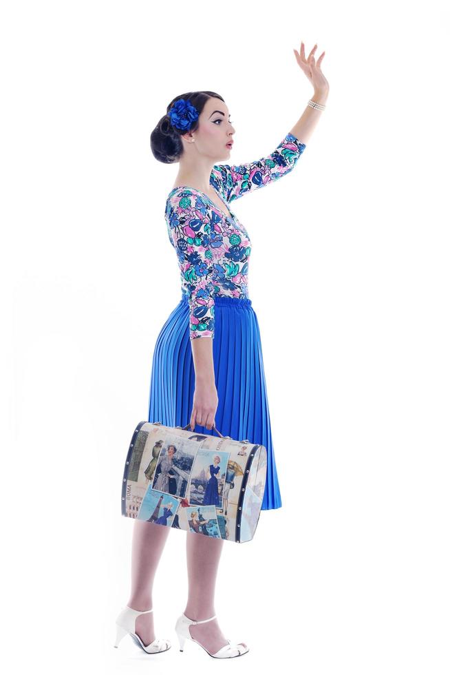 pinup retro frau mit reisetasche isoliert foto