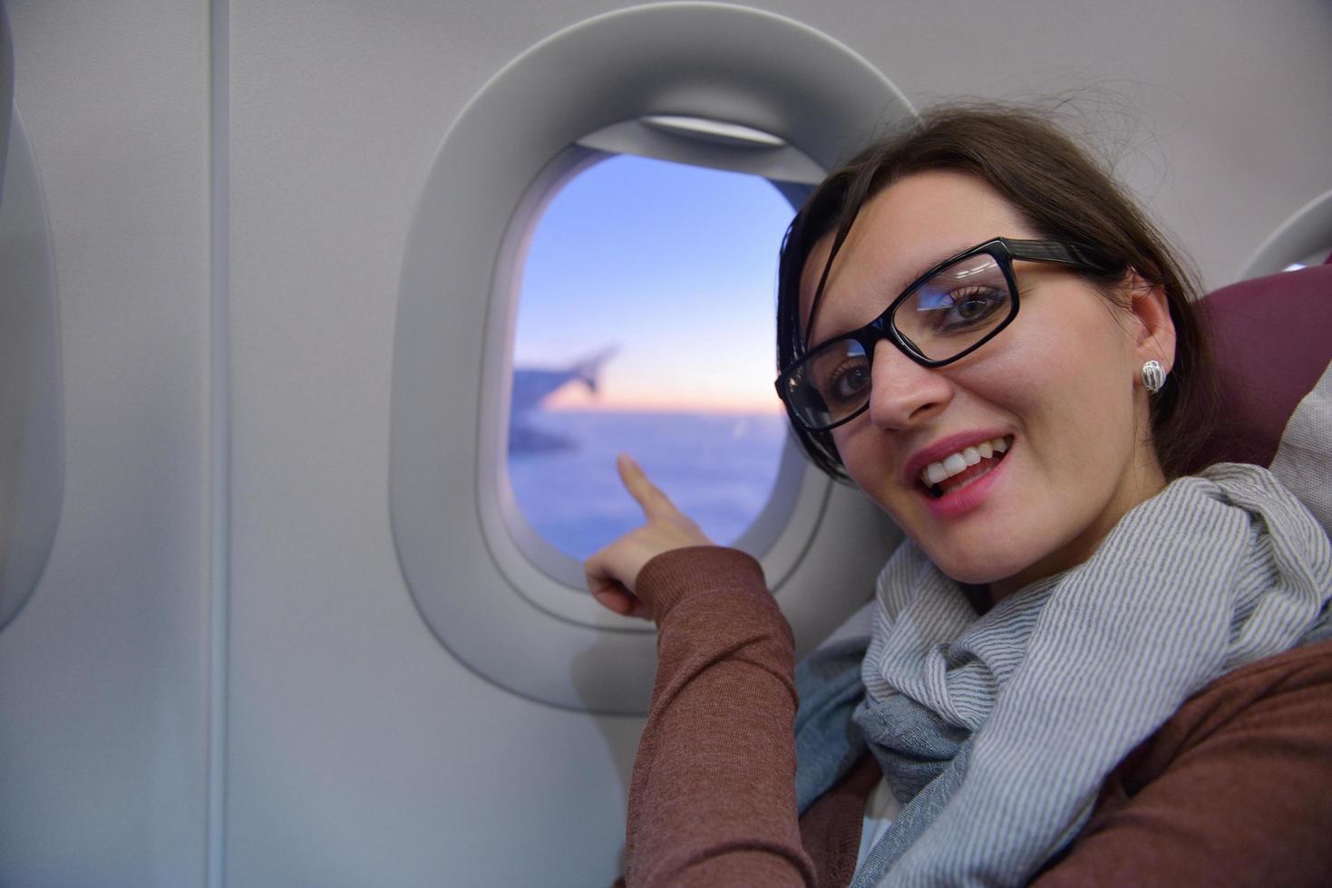 Frau bei Flugreisen foto