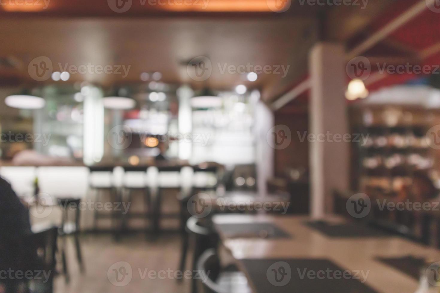 Café-Restaurant-Interieur mit Bartheke verwischen abstrakten Hintergrund mit Bokeh-Licht foto