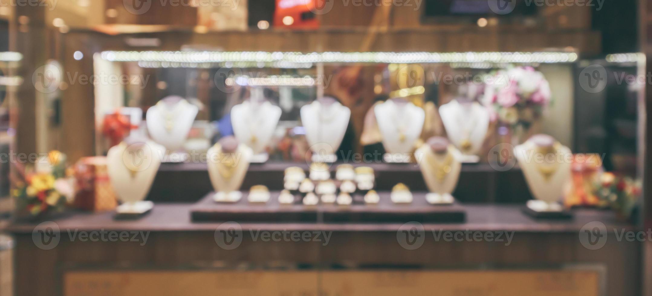 goldschmuck diamant schaufenster display abstrakte unschärfe mit bokeh hellem hintergrund foto