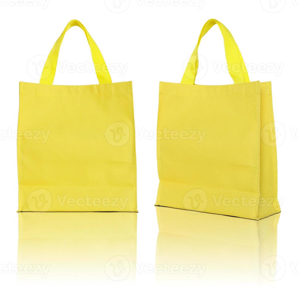 Gelbe Einkaufstasche auf weißem Hintergrund foto