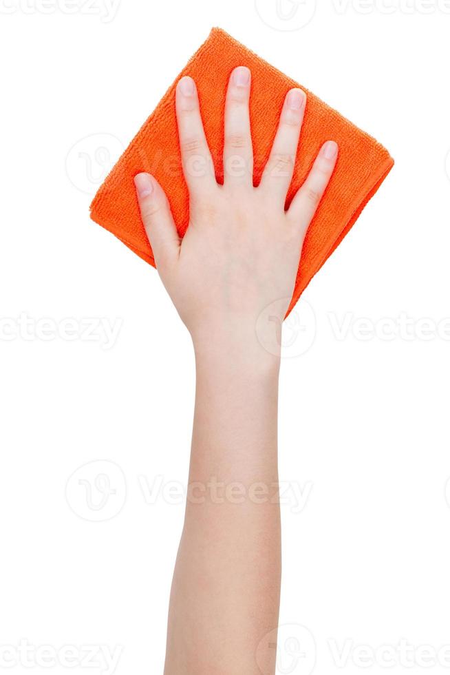 Draufsicht der Hand mit orangefarbenem Putzlappen isoliert foto