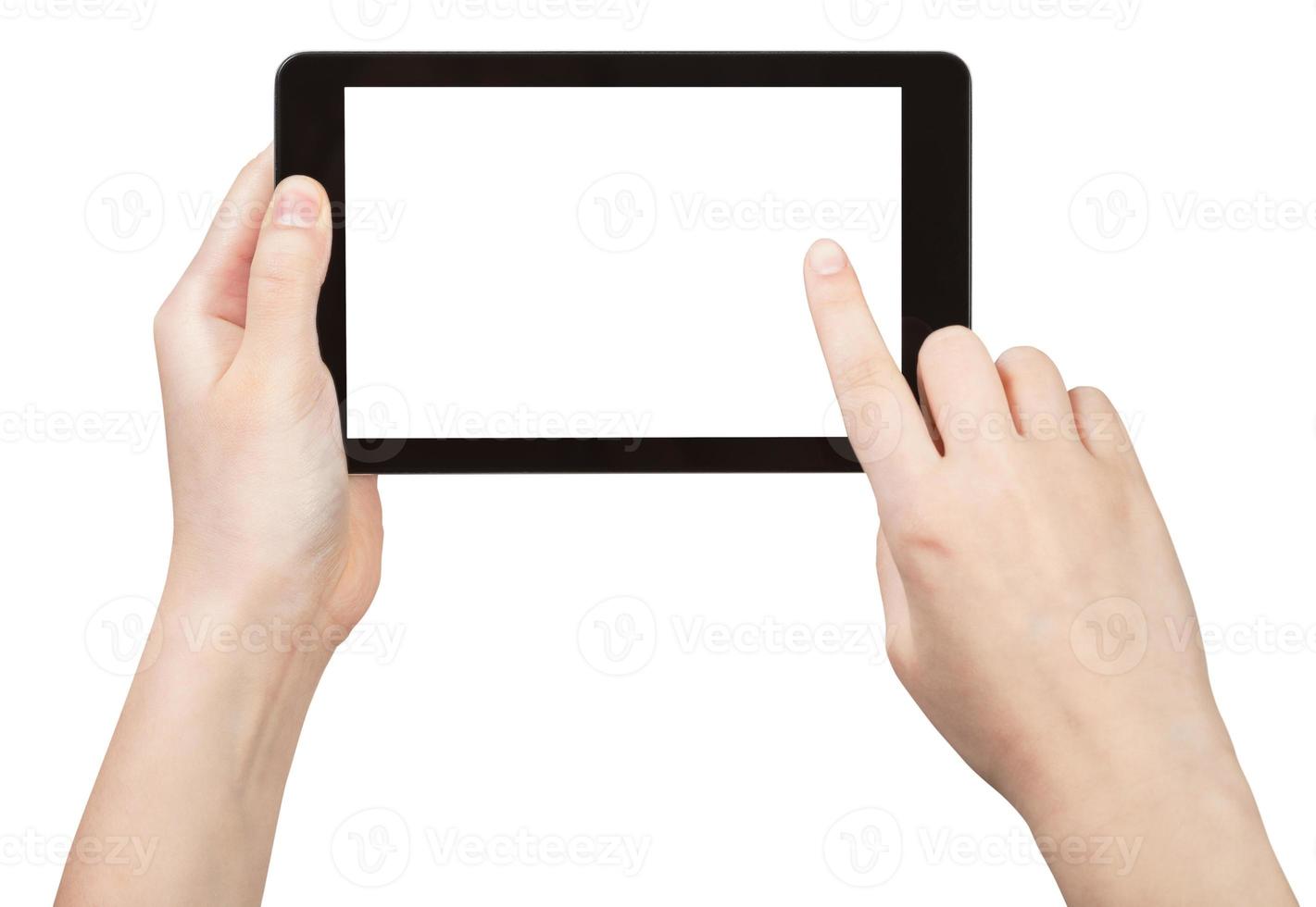 Finger berühren Tablet-PC mit ausgeschnittenem Bildschirm foto