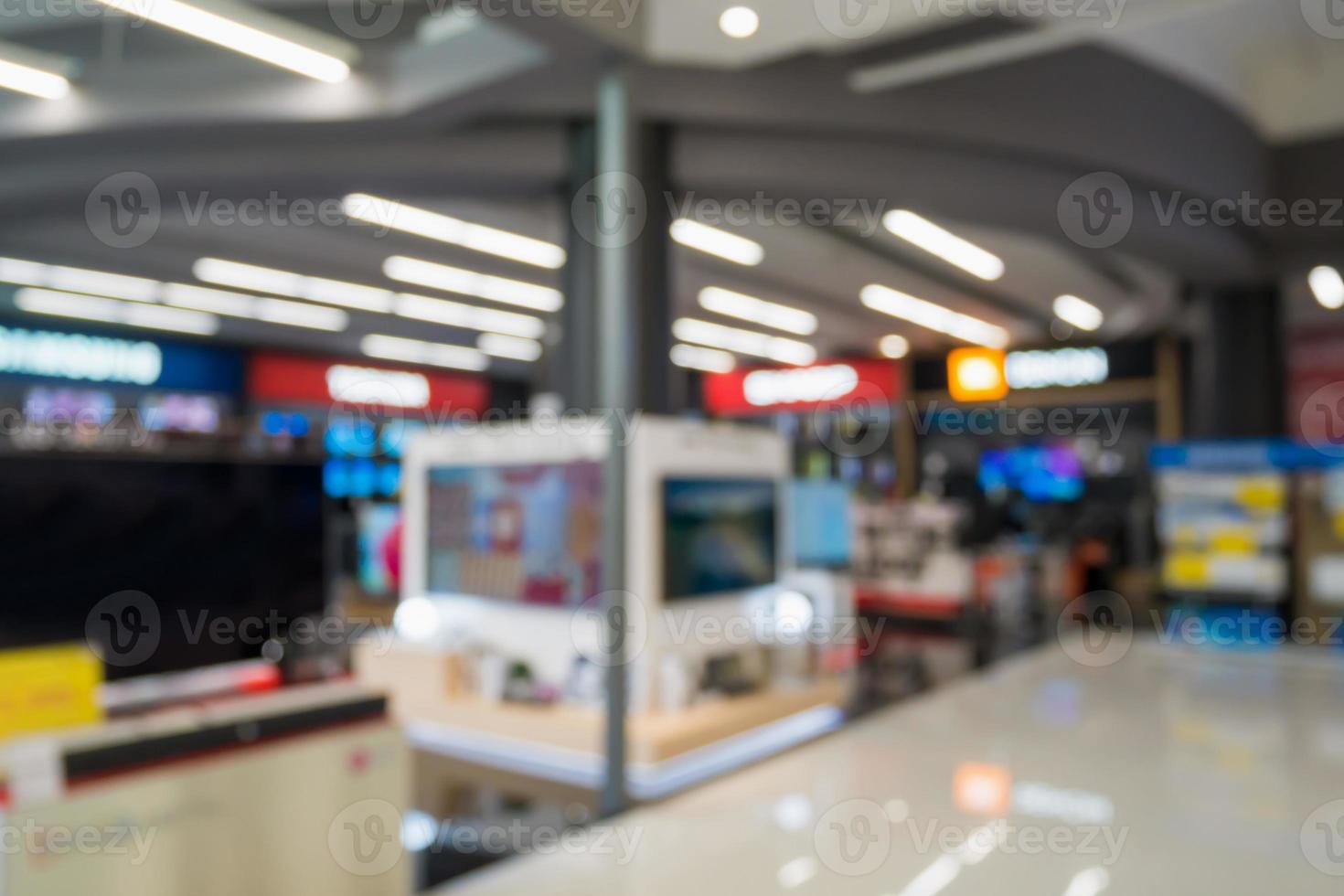 elektronisches kaufhaus mit bokeh verschwommenem hintergrund foto