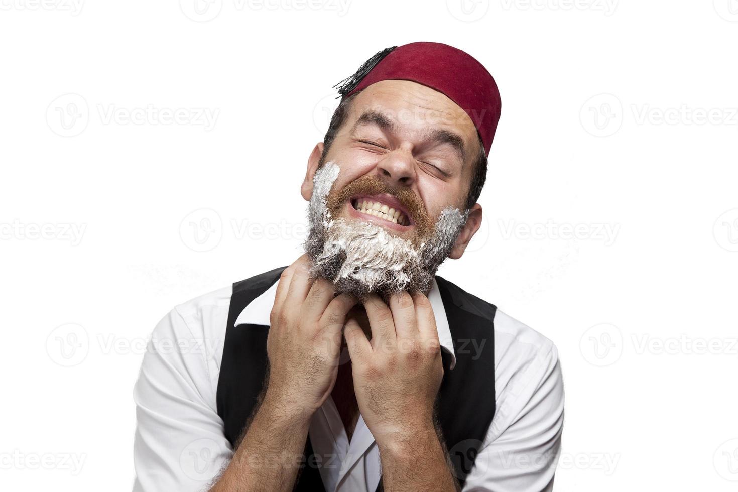 Mann im traditionellen türkischen Hut und Kleid kabadayi unglückliche Rasur foto