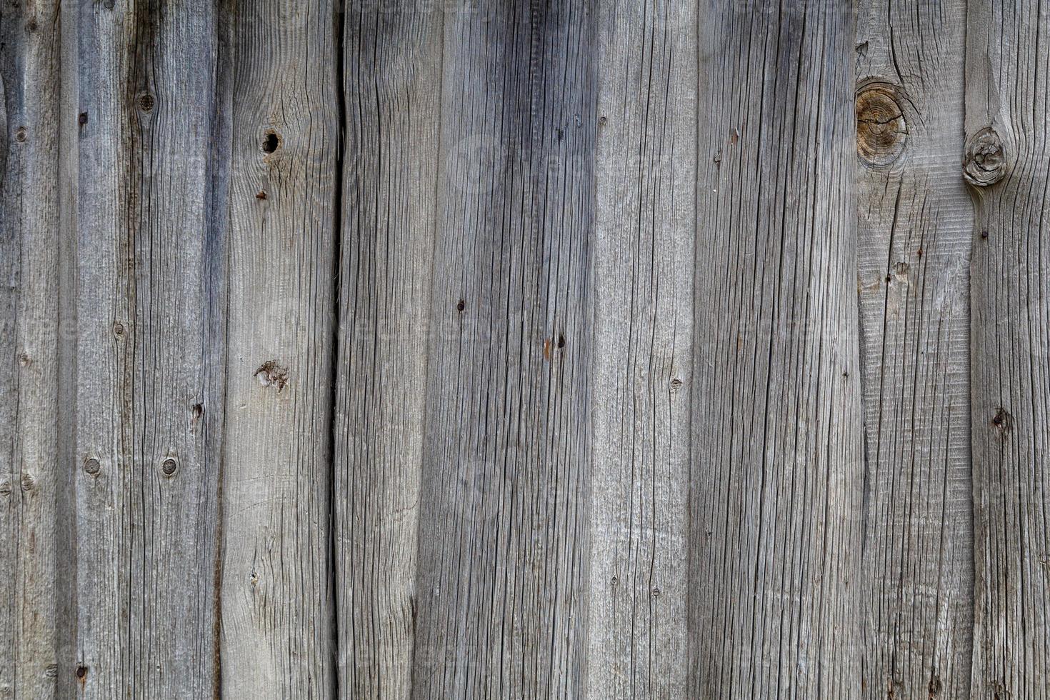 graue trockene holzbohlen wandoberflächenstruktur und hintergrund foto