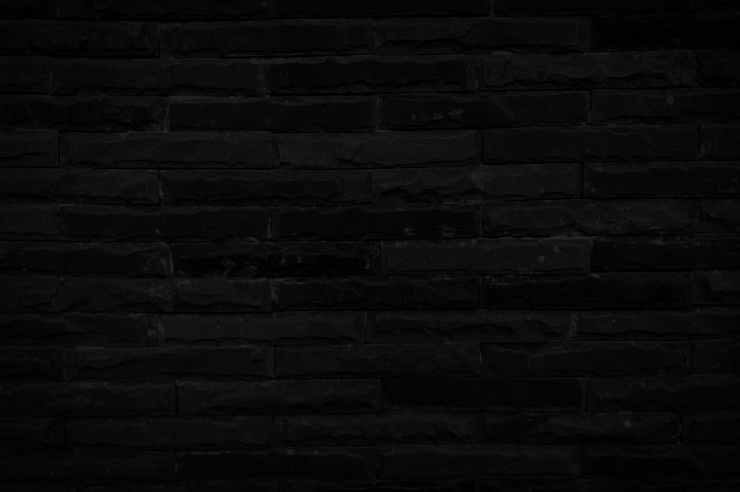 alte schwarze Mauer Textur für den Hintergrund mit Kopierraum für Design. dunkle Tapete foto