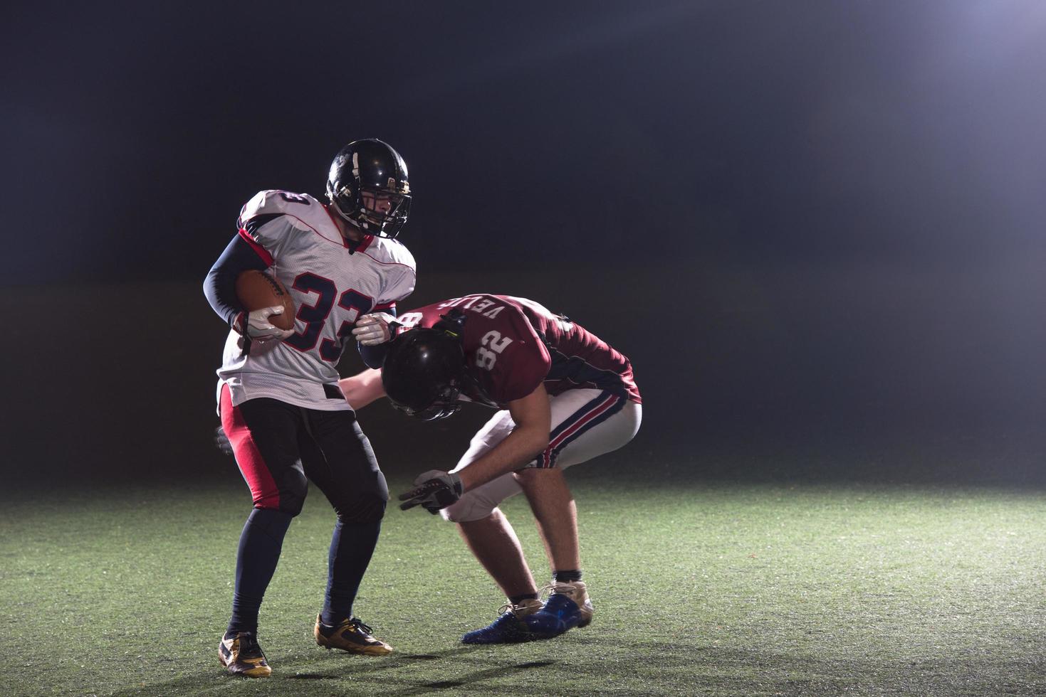 American-Football-Spieler in Aktion foto